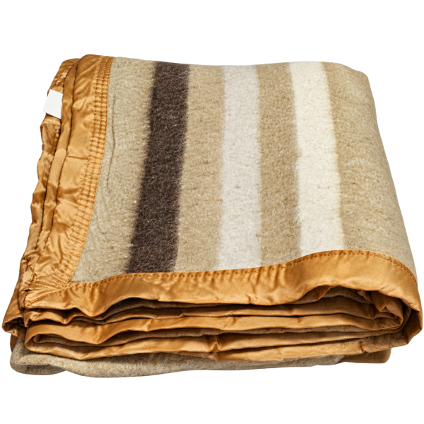 Manta beige rayada doblada Manta Beige térmica marca Incatex